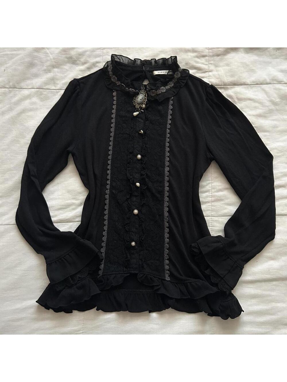Axes Femme black long sleeve blouse cameo pendant neckline detail